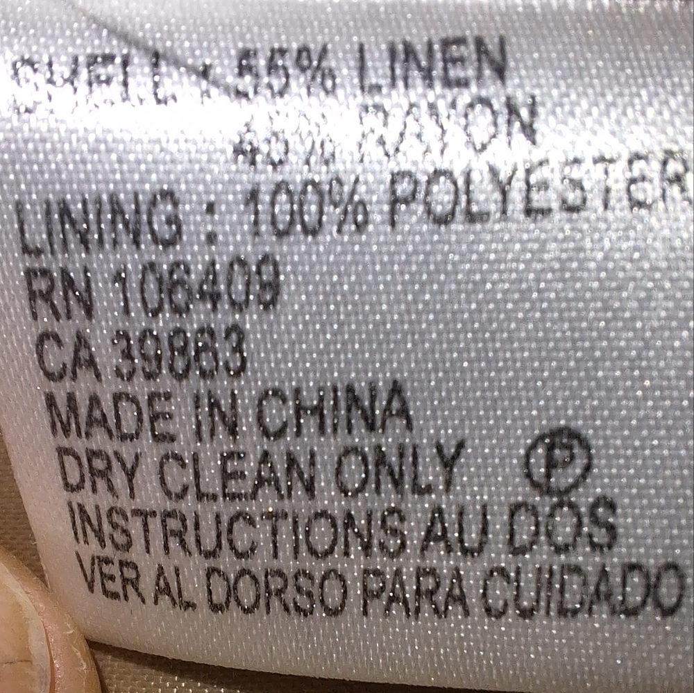 A Tahari short sleeve button-down top with a waist belt. Pre-loved - Picture 4 of 6